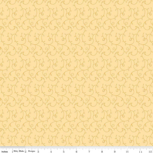 Image of Flourish Vines Lemon quilting cotton fabric by Sue Daley for Riley Blake Designs. Features leaves and vines on a yellow background. Cute Little Fabric Shop.