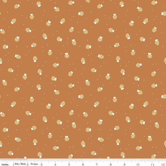 Image of Faraway Kingdom Mushroom Cheer Earth quilting cotton fabric by Natàlia Juan Abelló for Riley Blake Designs. Features mushrooms on a brown background. Cute Little Fabric Shop.
