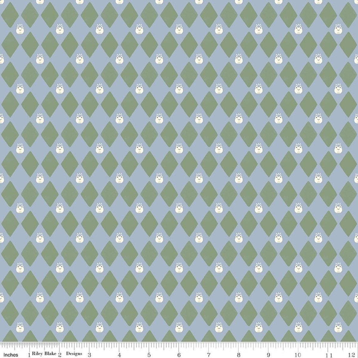 Image of Faraway Kingdom Harlequin Prince Sky quilting cotton fabric by Natàlia Juan Abelló for Riley Blake Designs. Features diamonds on a blue background. Cute Little Fabric Shop.