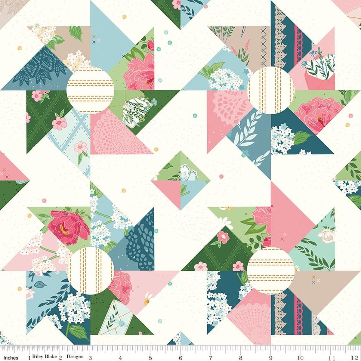 Image of Correspondence Cheater Print Multi quilting cotton fabric by Beverly McCullough for Riley Blake Designs. Features printed quilt blocks on a white background. Cute Little Fabric Shop.