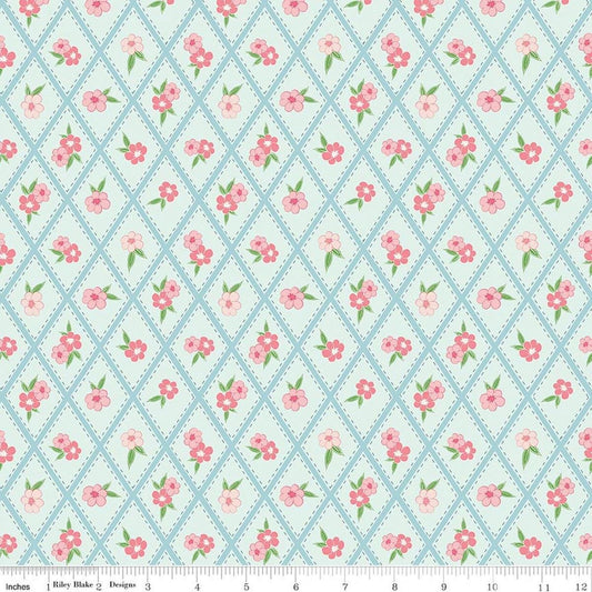 Image of Correspondence Stitched Flowers Washed Denim quilting cotton fabric by Beverly McCullough for Riley Blake Designs. Features flowers on a blue background. Cute Little Fabric Shop.