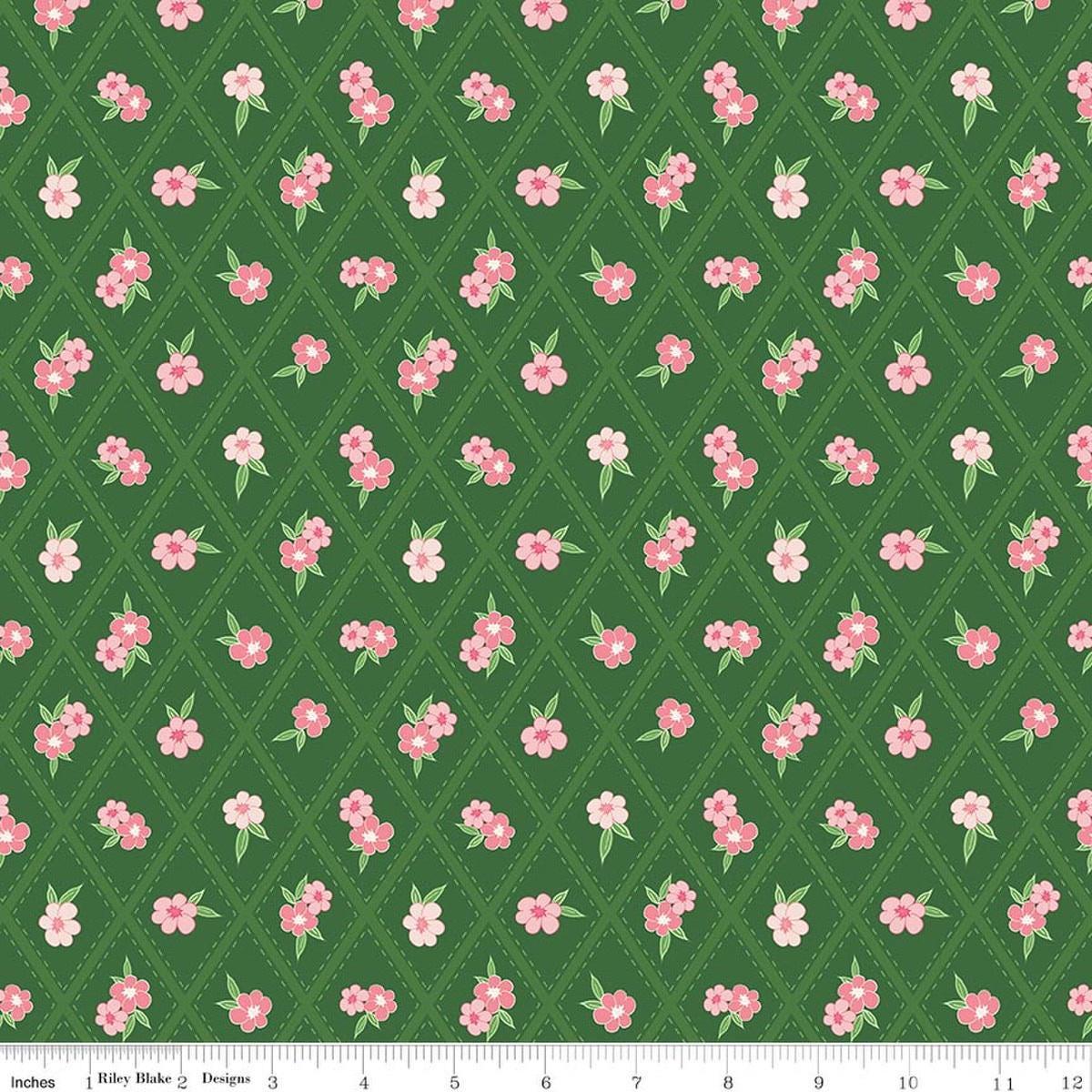 Image of Correspondence Stitched Flowers Pickle quilting cotton fabric by Beverly McCullough for Riley Blake Designs. Features flowers on a green background. Cute Little Fabric Shop.
