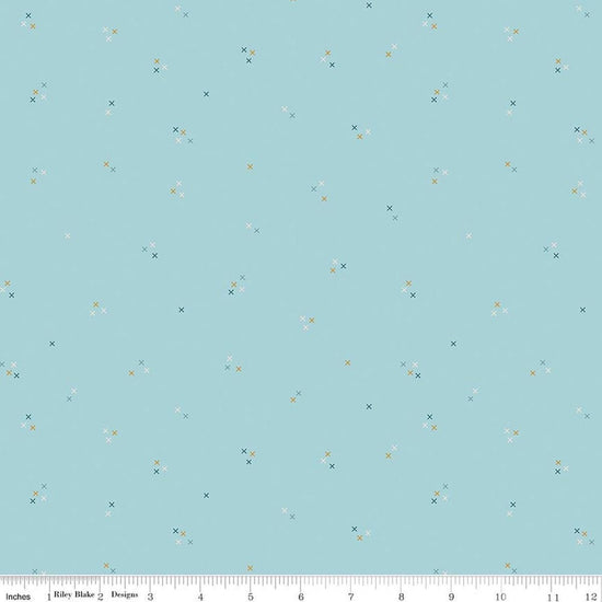 Image of Correspondence Stitching Aqua quilting cotton fabric by Beverly McCullough for Riley Blake Designs. Features tiny xs on a blue background. Cute Little Fabric Shop.