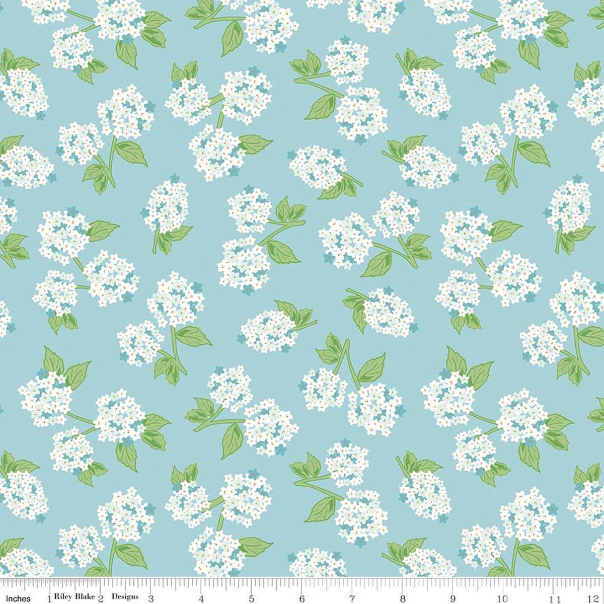Image of Correspondence Hydrangeas Aqua quilting cotton fabric by Beverly McCullough for Riley Blake Designs. Features flowers on a blue background. Cute Little Fabric Shop.