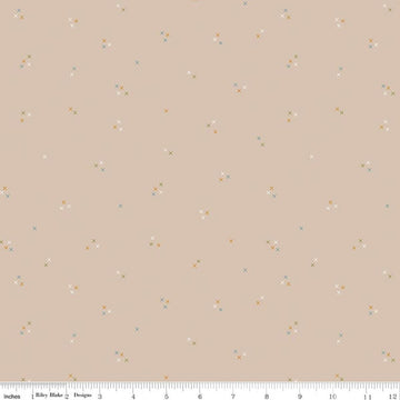 Image of Correspondence Stitching Wheat quilting cotton fabric by Beverly McCullough for Riley Blake Designs. Features tiny xs on a brown background. Cute Little Fabric Shop.