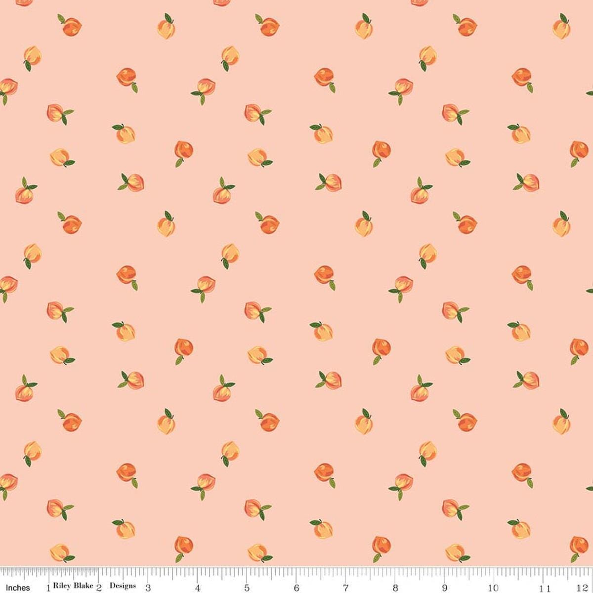 Image of Southern Charm Peaches Peaches 'n Cream quilting cotton fabric by The RBD Designers for Riley Blake Designs. Features peaches on an pink background. Cute Little Fabric Shop.