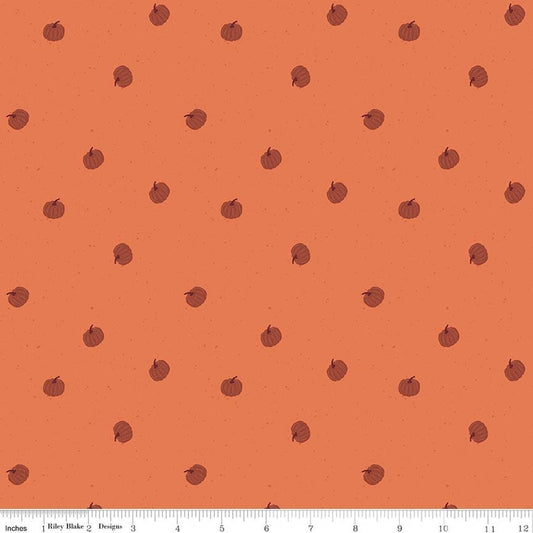 Image of The Apothecary Pumpkin Toss Marmalade quilting cotton fabric by Amber Elliot for Riley Blake Designs. Features pumpkins on an orange background. Cute Little Fabric Shop.