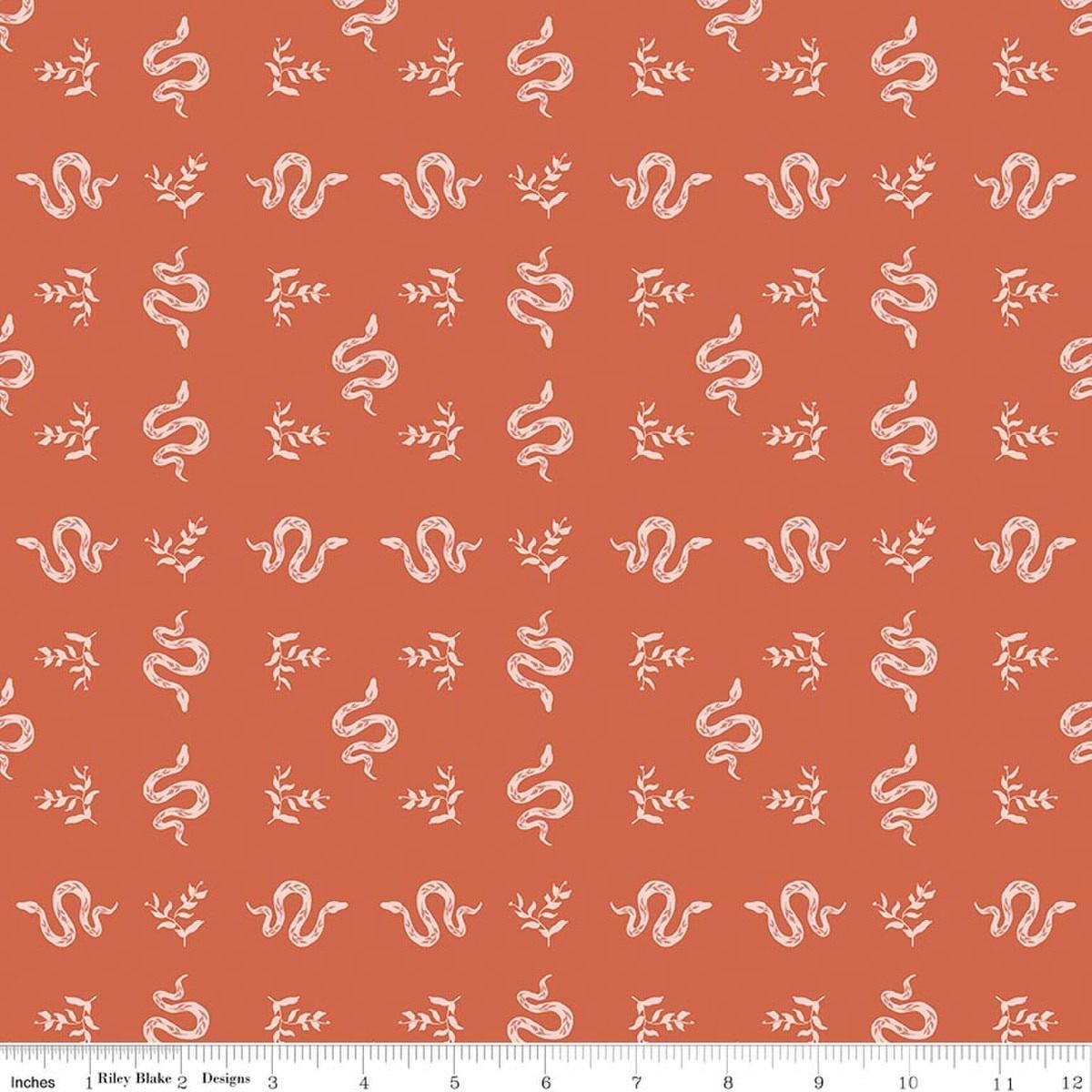 Image of The Apothecary Serpents Autumn quilting cotton fabric by Amber Elliot for Riley Blake Designs. Features snakes on an orange background. Cute Little Fabric Shop.