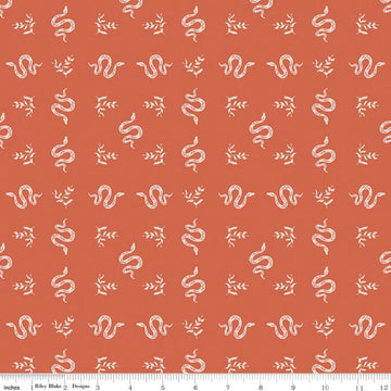 Image of The Apothecary Serpents Autumn quilting cotton fabric by Amber Elliot for Riley Blake Designs. Features snakes on an orange background. Cute Little Fabric Shop.