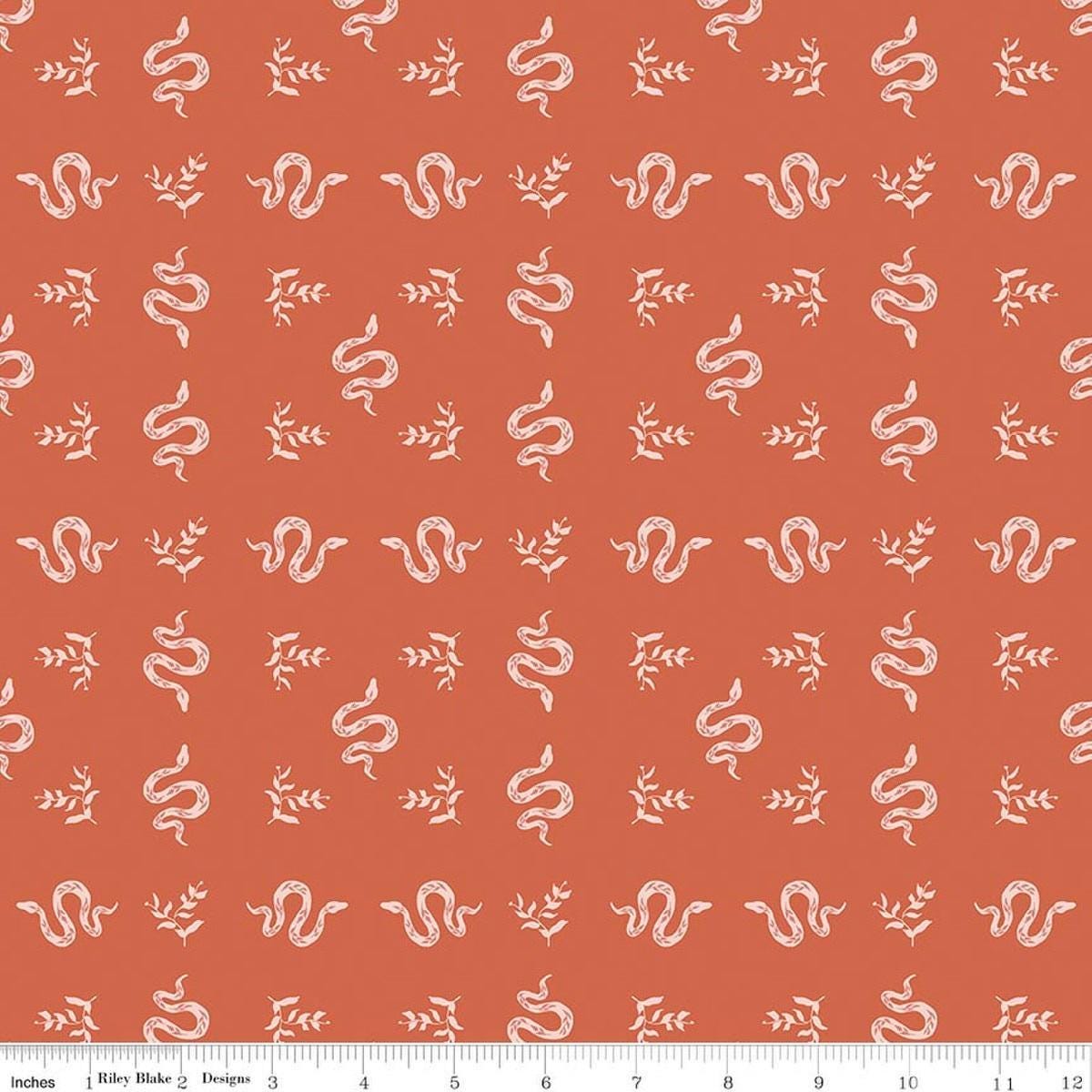 Image of The Apothecary Serpents Autumn quilting cotton fabric by Amber Elliot for Riley Blake Designs. Features snakes on an orange background. Cute Little Fabric Shop.