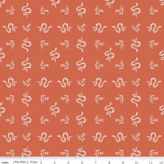 Image of The Apothecary Serpents Autumn quilting cotton fabric by Amber Elliot for Riley Blake Designs. Features snakes on an orange background. Cute Little Fabric Shop.