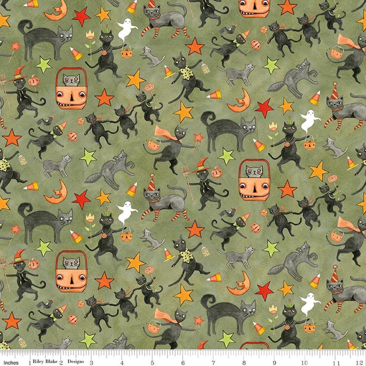 Image of Spooky Cats Green quilting cotton fabric by Teresa Kogut for Riley Blake Designs. Features cats on a green background. Cute Little Fabric Shop.