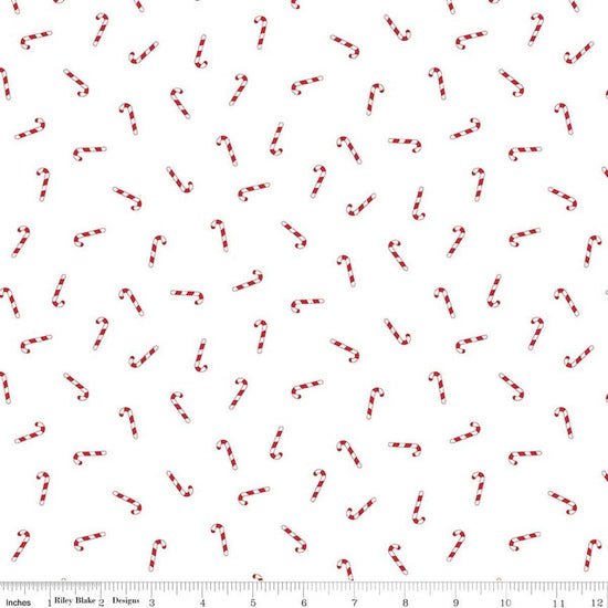 Image of Seasonal Basics Candy Canes White quilting cotton fabric by Christopher Thompson for Riley Blake Designs. Features candy canes on a white background. Cute Little Fabric Shop.