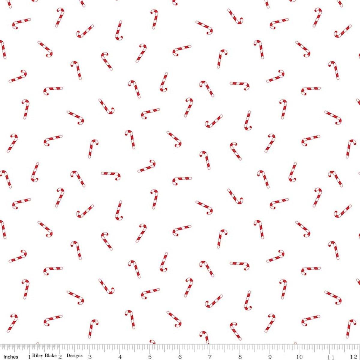Image of Seasonal Basics Candy Canes White quilting cotton fabric by Christopher Thompson for Riley Blake Designs. Features candy canes on a white background. Cute Little Fabric Shop.