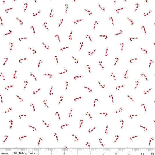 Image of Seasonal Basics Candy Canes White quilting cotton fabric by Christopher Thompson for Riley Blake Designs. Features candy canes on a white background. Cute Little Fabric Shop.