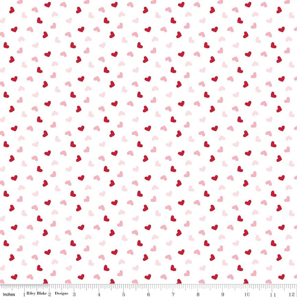 Image of Seasonal Basics Heart Toss White quilting cotton fabric by Christopher Thompson for Riley Blake Designs. Features hearts on a white background. Cute Little Fabric Shop.