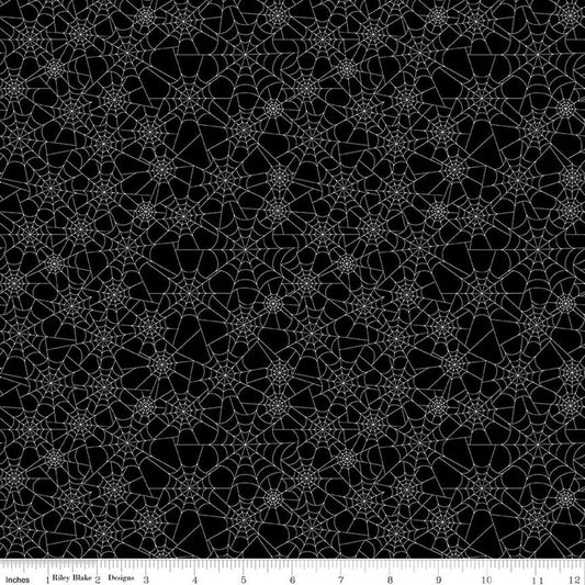 Image of Seasonal Basics Spider Webs Black Glow in the Dark quilting cotton fabric by Christopher Thompson for Riley Blake Designs. Features spider webs on a black background. Cute Little Fabric Shop.