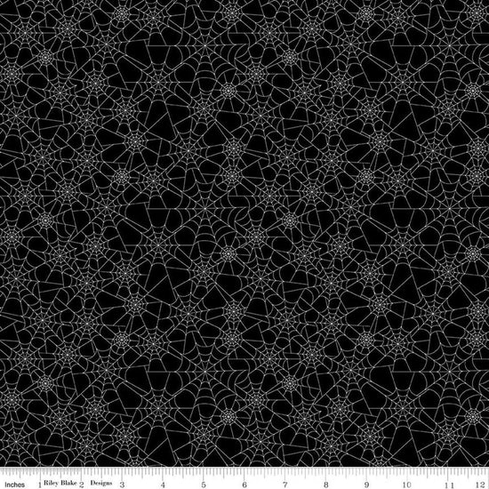 Image of Seasonal Basics Spider Webs Black Glow in the Dark quilting cotton fabric by Christopher Thompson for Riley Blake Designs. Features spider webs on a black background. Cute Little Fabric Shop.