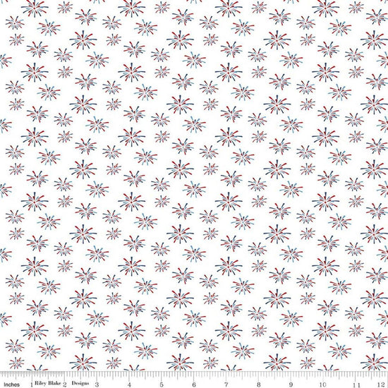 Image of Seasonal Basics Fireworks White quilting cotton fabric by Christopher Thompson for Riley Blake Designs. Features fireworks on a white background. Cute Little Fabric Shop.
