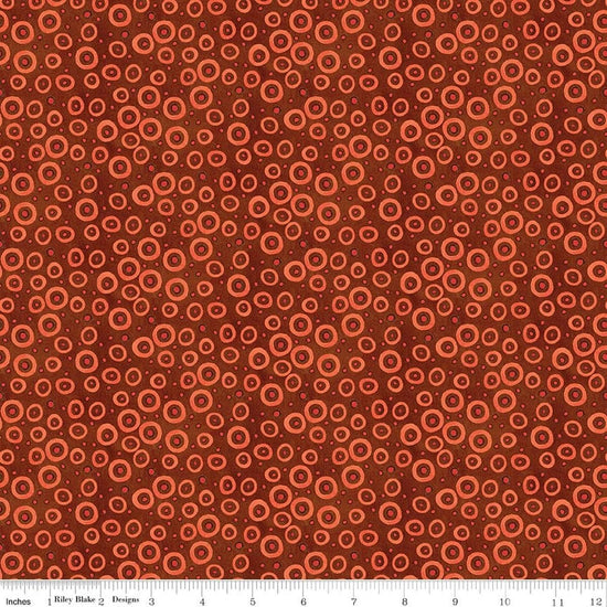Image of Spooky Polka Dots Rusty Oak quilting cotton fabric by Teresa Kogut for Riley Blake Designs. Features dots on an orange background. Cute Little Fabric Shop.