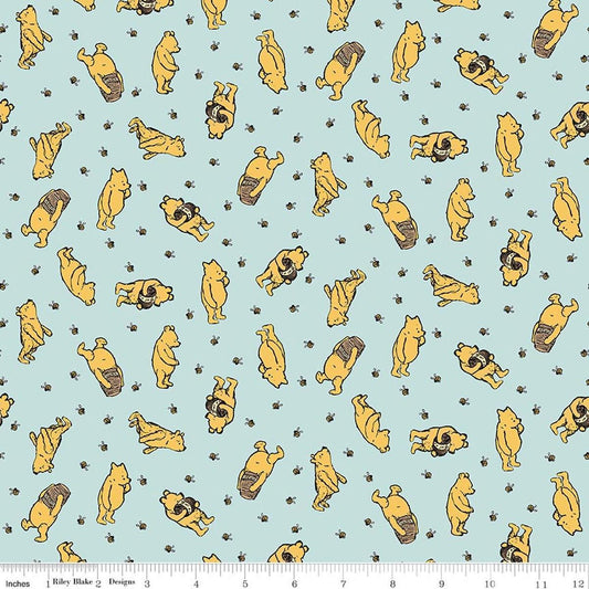 Image of Designer Flannel Winnie the Pooh Toss Blue by Echo Park Paper Co for Riley Blake Designs. Features bears on a blue background. Cute Little Fabric Shop.