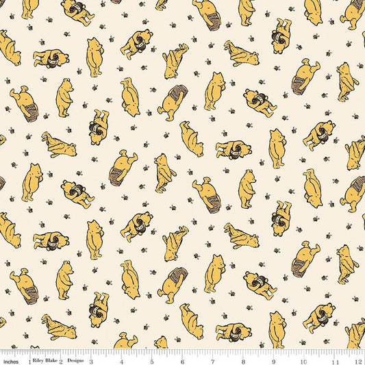 Image of Designer Flannel Winnie the Pooh Toss Cream by Echo Park Paper Co for Riley Blake Designs. Features bears on a cream background. Cute Little Fabric Shop.
