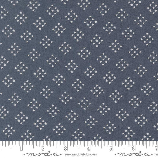 Independence Day Stars Indigo quilting cotton fabric by Sweetwater for Moda Fabrics. Features stars on a blue background. Cute Little Fabric Shop.