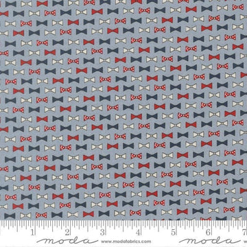 Independence Day Bowties Splash quilting cotton fabric by Sweetwater for Moda Fabrics. Features bowties on a blue background. Cute Little Fabric Shop.