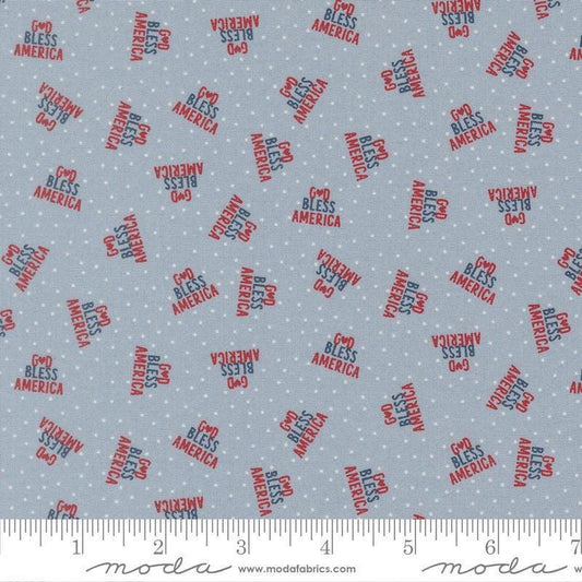 Independence Day God Bless America Splash quilting cotton fabric by Sweetwater for Moda Fabrics. Features dots on a blue background. Cute Little Fabric Shop.