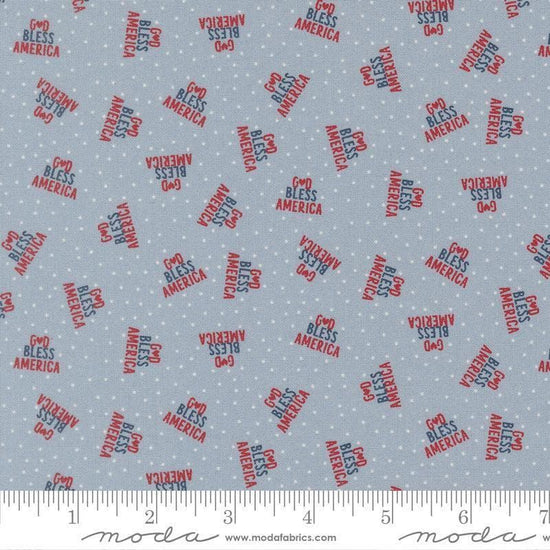 Independence Day God Bless America Splash quilting cotton fabric by Sweetwater for Moda Fabrics. Features dots on a blue background. Cute Little Fabric Shop.