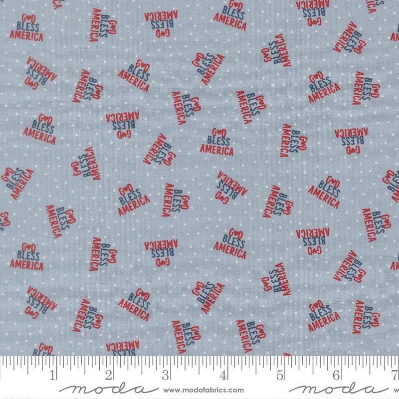 Independence Day God Bless America Splash quilting cotton fabric by Sweetwater for Moda Fabrics. Features dots on a blue background. Cute Little Fabric Shop.