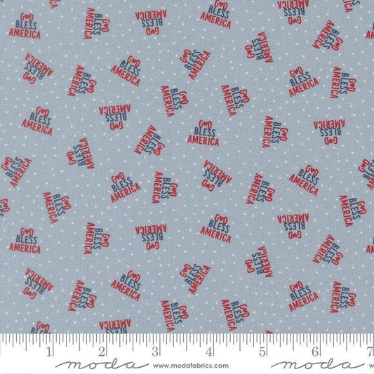 Independence Day God Bless America Splash quilting cotton fabric by Sweetwater for Moda Fabrics. Features dots on a blue background. Cute Little Fabric Shop.