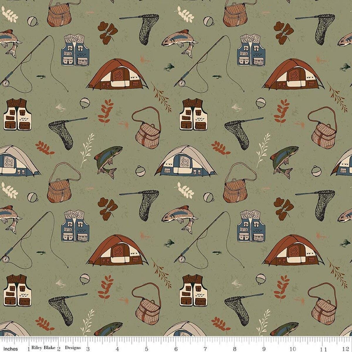 Image of Designer Flannel Let's Wander Gone Fishing Sage flannel cotton fabric by Casey Cometti for Riley Blake Designs. Features camping gear on a green background. Cute Little Fabric Shop.