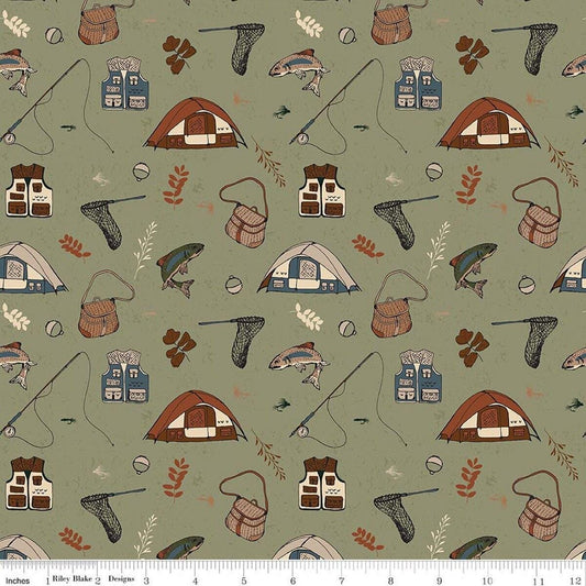Image of Designer Flannel Let's Wander Gone Fishing Sage flannel cotton fabric by Casey Cometti for Riley Blake Designs. Features camping gear on a green background. Cute Little Fabric Shop.