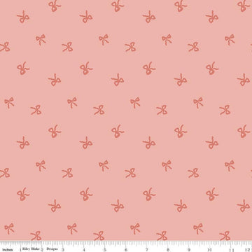 Image of Designer Flannel Sweet Cotton Tales Bows Pink quilting cotton fabric by Little Forest Atelier for RIley Blake Designs. Features bows on a pink background. Cute Little Fabric Shop.