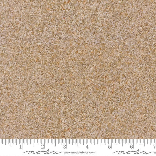 Image of Saltwater Sandbar Sand quilting cotton fabric by Cathe Holden for Moda Fabrics. Features beach sand on a beige background. Cute Little Fabric Shop.