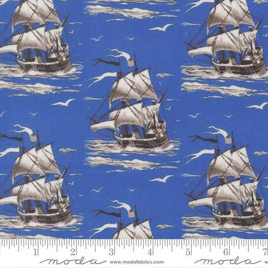 Image of Saltwater Smooth Sailing Ocean quilting cotton fabric by Cathe Holden for Moda Fabrics. Features boats on a blue background. Cute Little Fabric Shop.