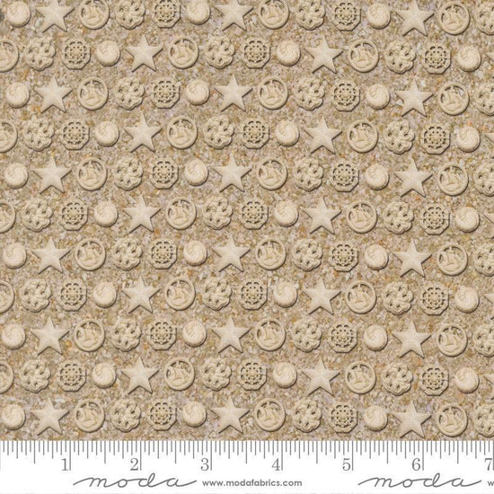 Image of Saltwater The White Pearl Sand quilting cotton fabric by Cathe Holden for Moda Fabrics. Features seashells on a beige background. Cute Little Fabric Shop.