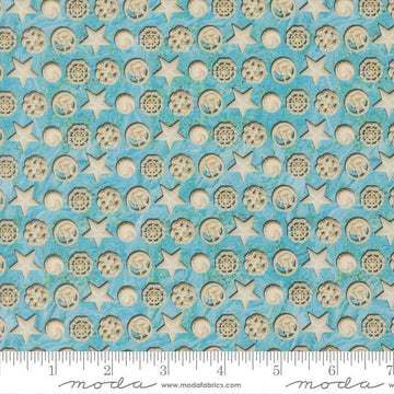 Image of Saltwater The White Pearl Surf quilting cotton fabric by Cathe Holden for Moda Fabrics. Features seashells on a blue background. Cute Little Fabric Shop.