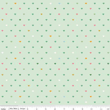 Image of Designer Flannel Meadow Serendipity 2 Hearts Mint flannel cotton fabric by Minki Kim for Riley Blake Designs. Features hearts on a green background. Cute Little Fabric Shop.