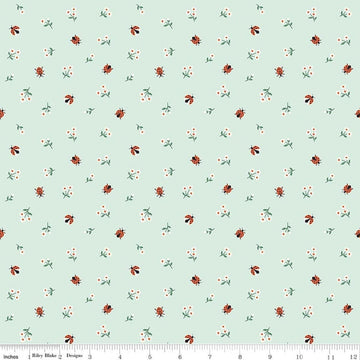 Image of Designer Flannel Meadow Moments Ladybugs Mint flannel cotton fabric by Sandra Nygard-Parthoens for Riley Blake Designs. Features ladybugs and flowers on a green background. Cute Little Fabric Shop.