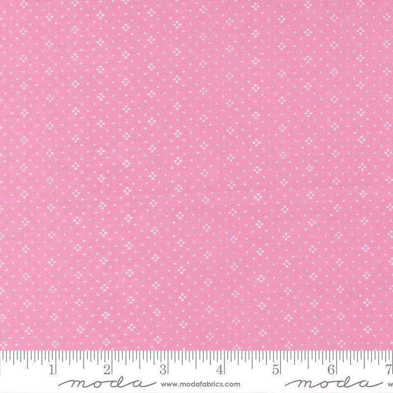 Image of Summers End Eyelet Lilac quilting cotton fabric by Fig Tree Co for Moda Fabrics. Features dots on a pink background. Cute Little Fabric Shop.