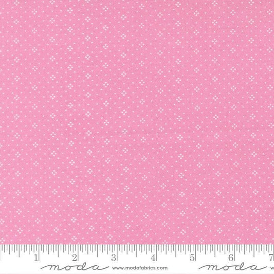 Image of Summers End Eyelet Lilac quilting cotton fabric by Fig Tree Co for Moda Fabrics. Features dots on a pink background. Cute Little Fabric Shop.