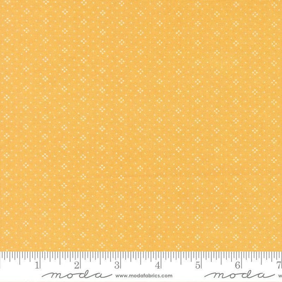 Image of Summers End Eyelet Sunflower quilting cotton fabric by Fig Tree Co for Moda Fabrics. Features dots on a yellow background. Cute Little Fabric Shop.