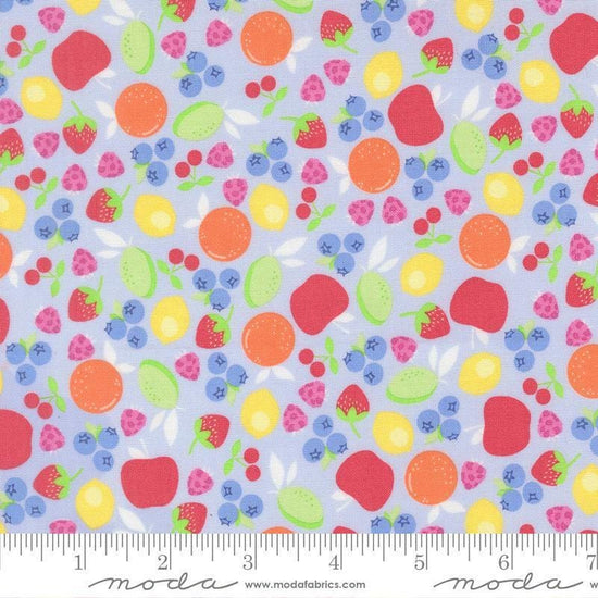 Image of Fruit Salad Novelty Light Blue quilting cotton fabric by Corey Yoder for Moda Fabrics. Features fruit on a blue background. Cute Little Fabric Shop.
