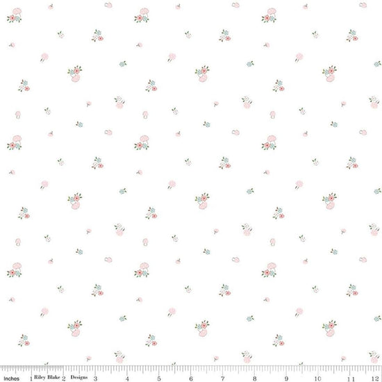 Image of Whimsical Woodland Mushrooms White quilting cotton fabric by Tasha Noel for Riley Blake Designs. Features flowers on a white background. Cute Little Fabric Shop.