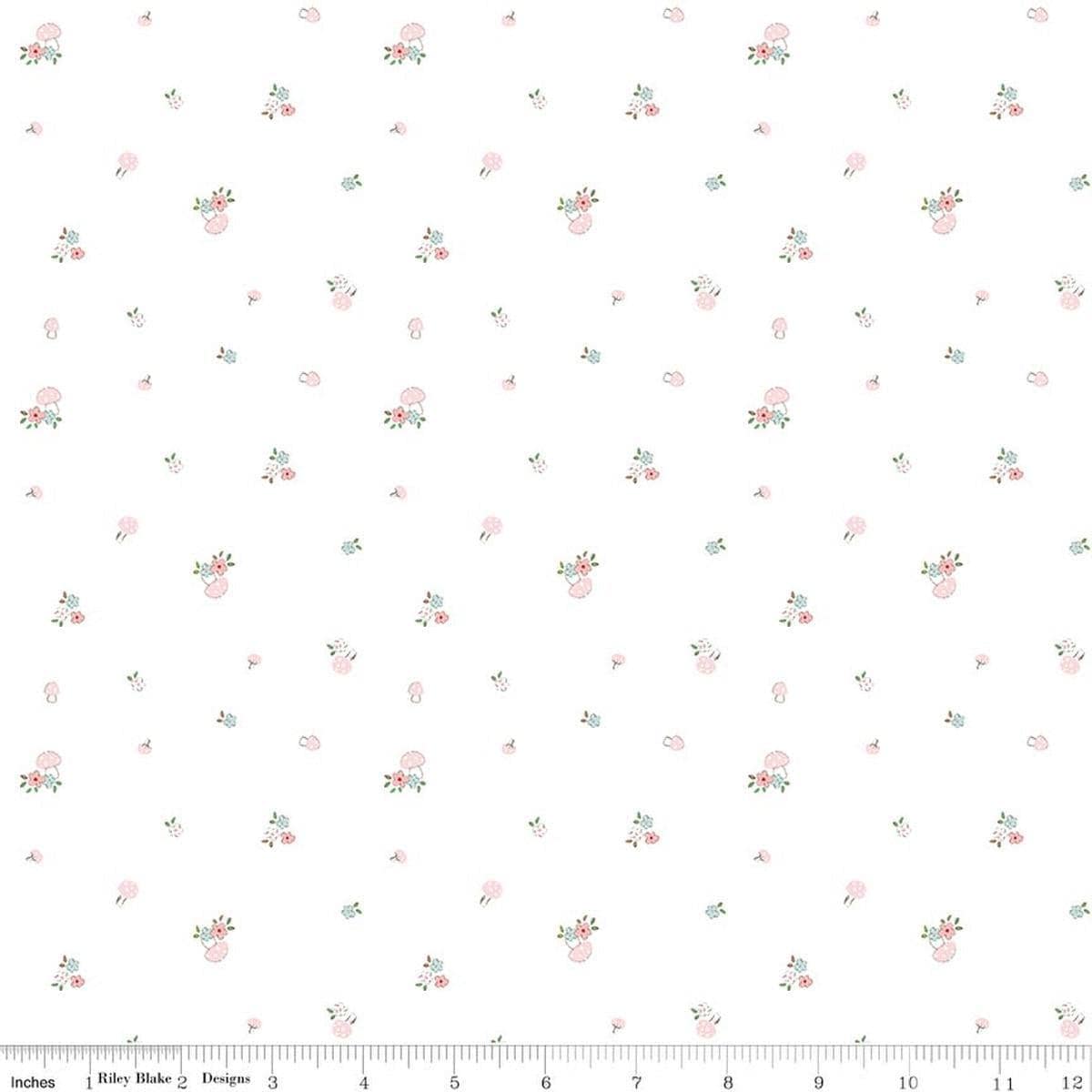 Image of Whimsical Woodland Mushrooms White quilting cotton fabric by Tasha Noel for Riley Blake Designs. Features flowers on a white background. Cute Little Fabric Shop.
