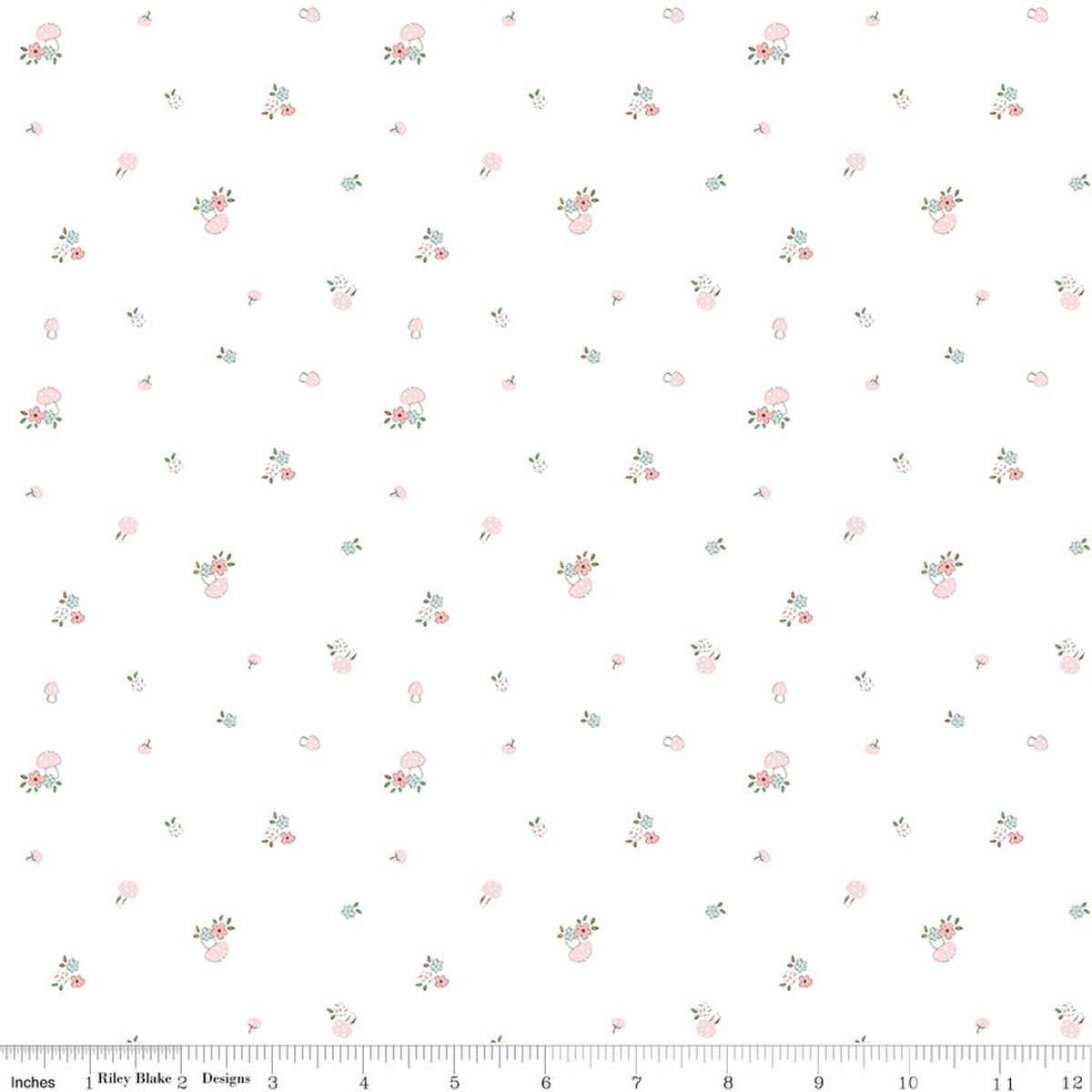 Image of Whimsical Woodland Mushrooms White quilting cotton fabric by Tasha Noel for Riley Blake Designs. Features flowers on a white background. Cute Little Fabric Shop.