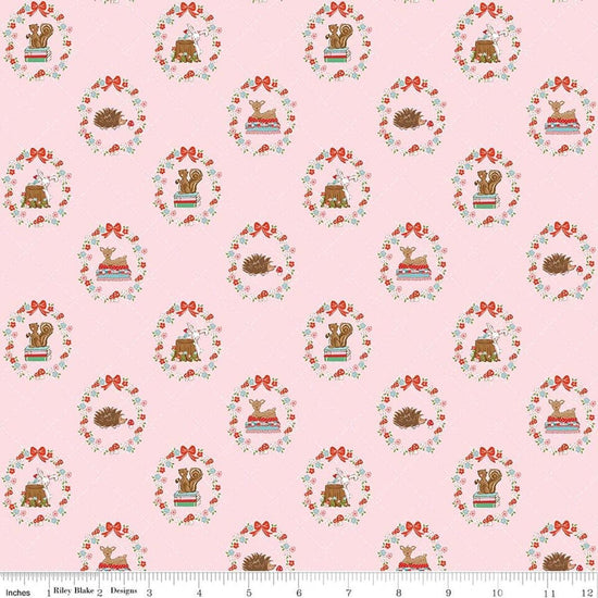 Image of Whimsical Woodland Animals Pink quilting cotton fabric by Tasha Noel for Riley Blake Designs. Features flowers and animals on a pink background. Cute Little Fabric Shop.