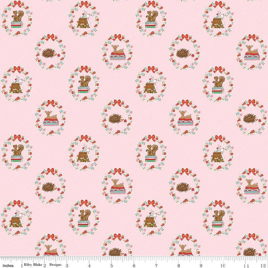 Image of Whimsical Woodland Animals Pink quilting cotton fabric by Tasha Noel for Riley Blake Designs. Features flowers and animals on a pink background. Cute Little Fabric Shop.